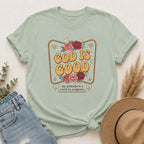 God Is Good T-Shirt — Floral Christian Faith Tee ("my attitude is a work in progress")