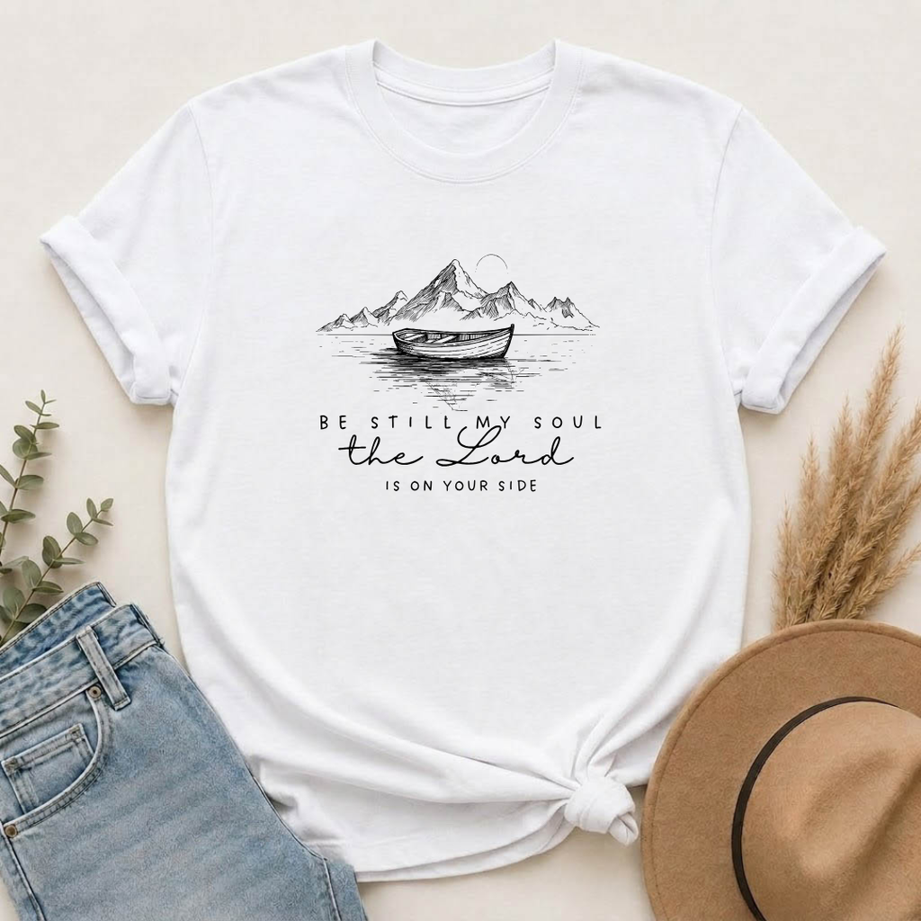 T-Shirt – “Be Still My Soul, the Lord Is On Your Side” Boat & Mountains Faith Tee